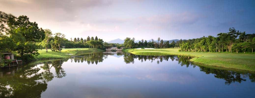 A serene lake at a golf course near Kennesaw, GA, which is one of the top three places we recommend for a staycation.