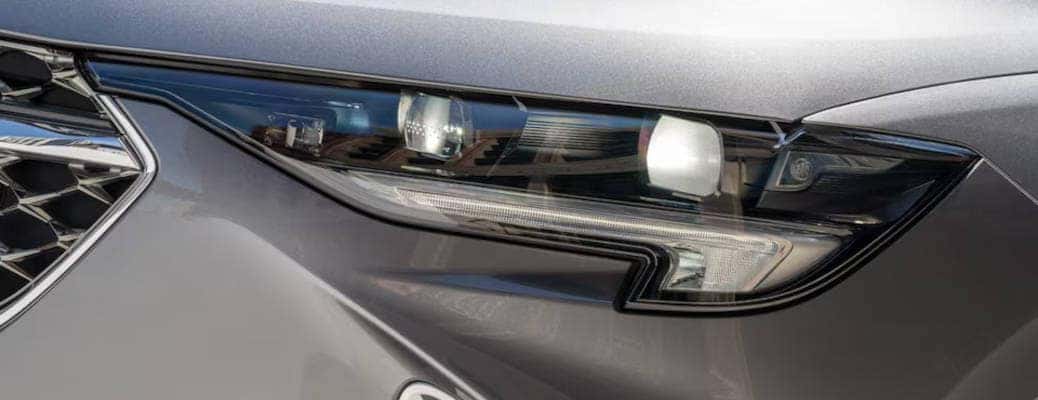 The front headlamps of the 2023 Buick Envision.
