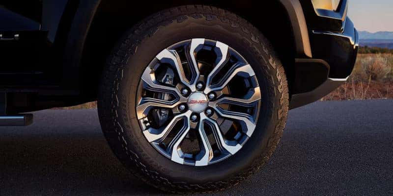 A detail shot of the front wheel of the GMC Canyon.