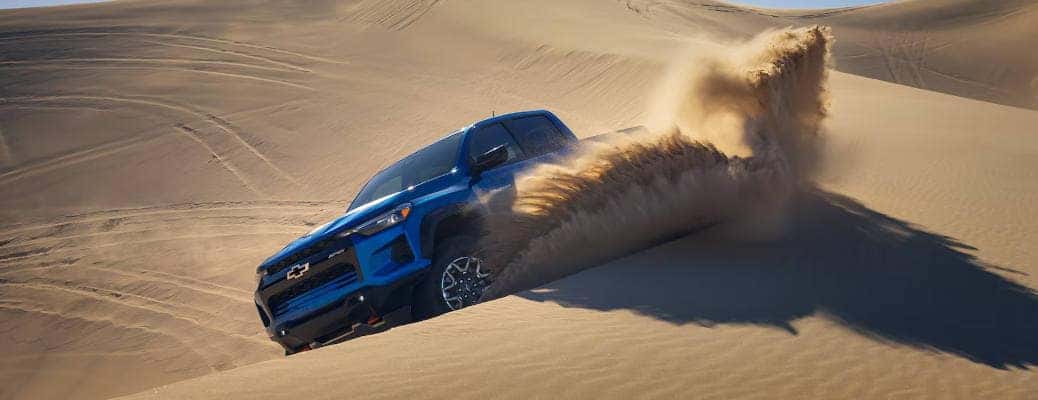 A side view of the 2024 Chevy Colorado demonstrating its off-road capabilities.