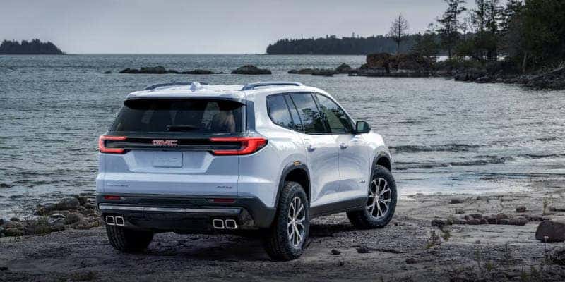 A rear quarter view of the 2024 GMC Acadia.