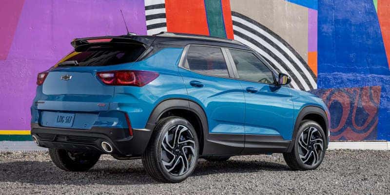 A rear quarter view of a blue 2025 Chevy Trailblazer.