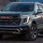 A front quarter exterior view of the night vision enabled 2025 GMC Yukon.