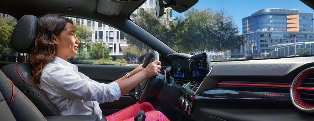 A girl using Teen Driver mode in a new Chevy.