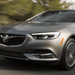 Grey 2019 Buick Regal Sportback driving on road
