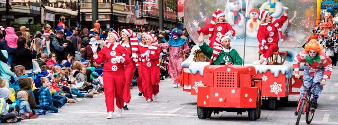 Holiday parade float and attendees