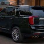 2021 GMC Yukon Denali parked outside a house