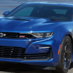 2021 Chevrolet Camaro driving down a highway road