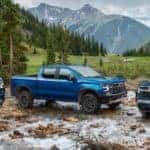 2022 Chevy Silverado Models in a valley in blue and black