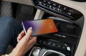 2022 Buick Envision interior with smartphone