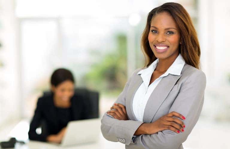 two women in an office setting