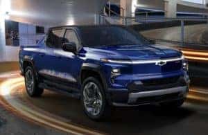 2024 Chevrolet Silverado EV driving on a road
