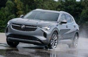 2022 Buick Envision driving on a wet road