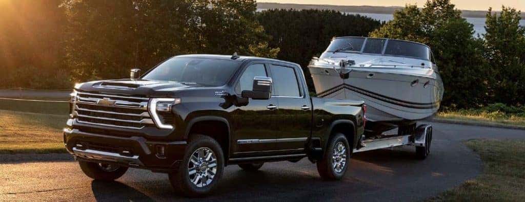 2024 Chevrolet Silverado truck with a boat