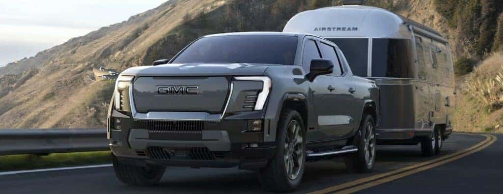 2023 GMC Sierra EV Denali with a trailer