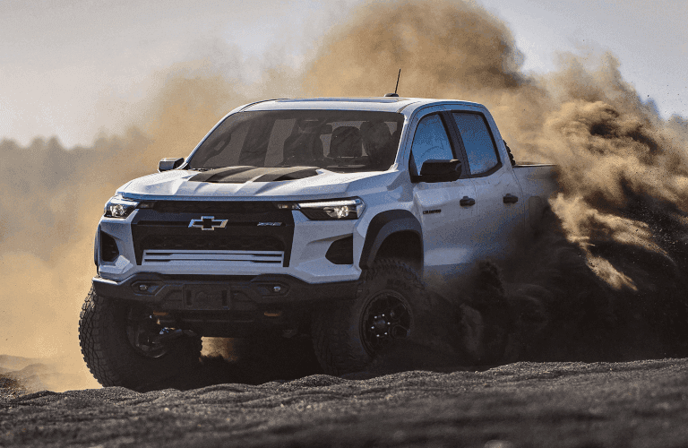 2024 Chevrolet Colorado ZR2 Bison in a dirt cloud