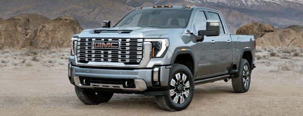 2024 GMC Sierra HD truck front view on sand