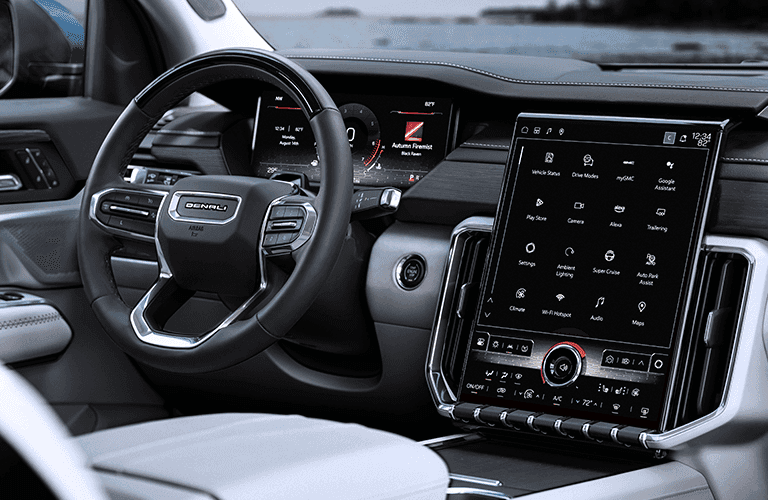 2024 GMC Acadia Denali front seats and steering wheel