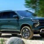 2025 Chevrolet Tahoe side view parked on a beach