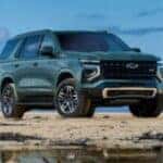 2025 Chevrolet Tahoe parked on a beach