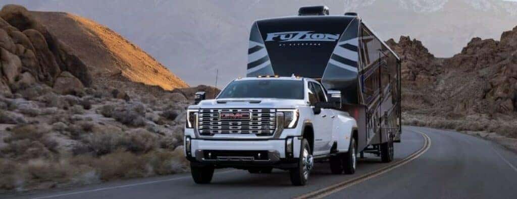 2024 GMC Sierra HD Denali towing a trailer