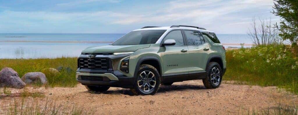 2025 Chevrolet Equinox front and side view on a beach