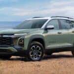 2025 Chevrolet Equinox front and side view on a beach