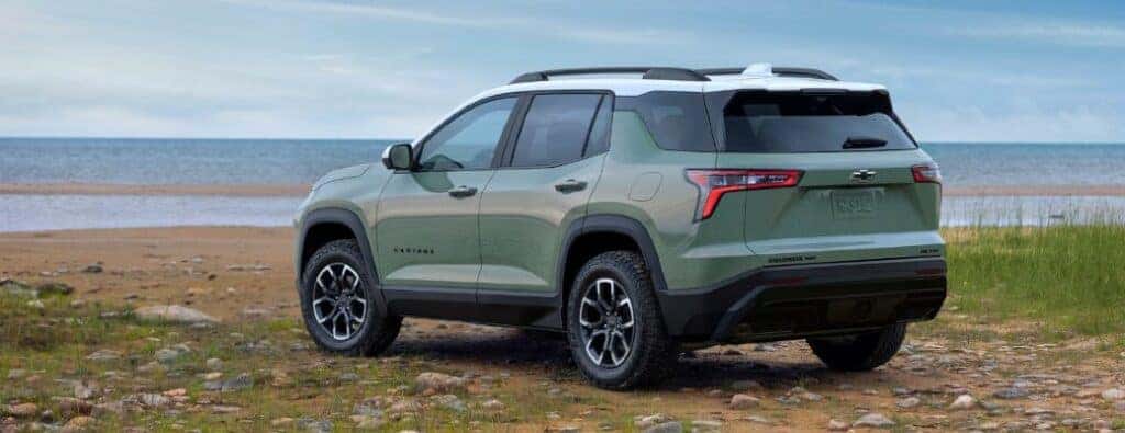2025 Chevrolet Equinox Activ rear view on a beach