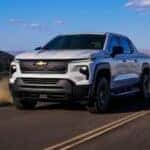 2024 Chevrolet Silverado EV WT front view on a road