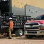 GM Fleet Program vehicles parked at a work site