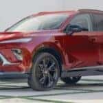 Buick Envision side view in red