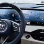 2025 Buick Enclave Sport Touring steering wheel and display screen