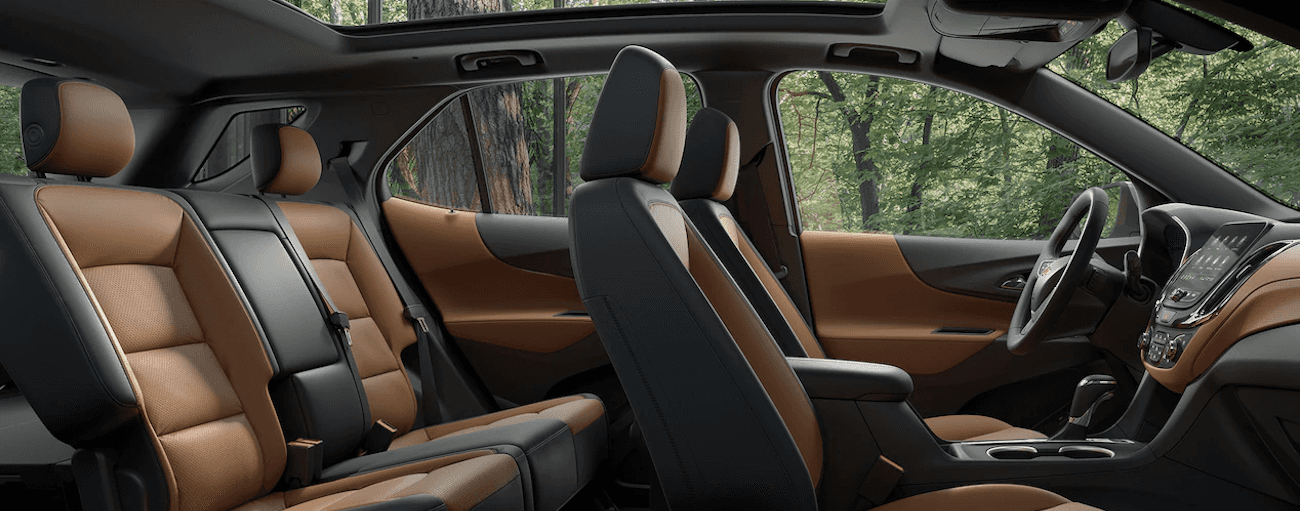 The high tech brown and black leather interior of the 2019 Chevy Equinox