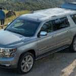 Grey 2020 Chevrolet Suburban parked on top of a hill