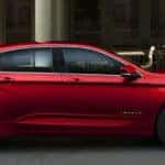 red chevrolet impala side view