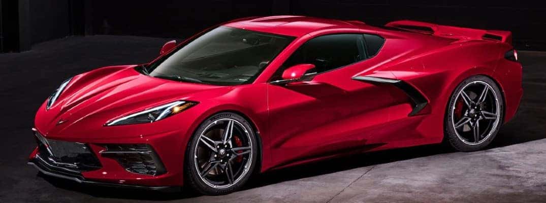 red chevrolet corvette side view