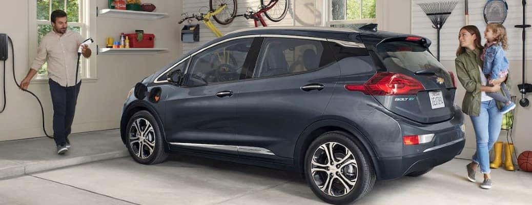 2021 Chevrolet Bolt EV side view with two people