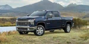 A 2022 Chevy Silverado 2500 HD parked in a field. 