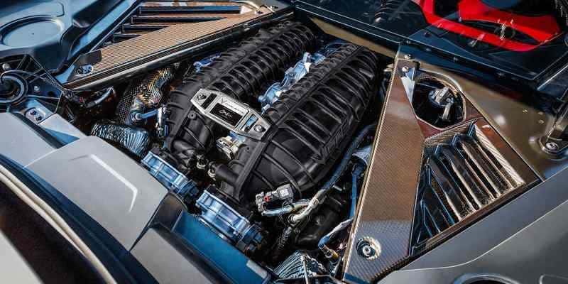 A highly detailed close up shot of the engine and components in a 2023 Chevy Corvette Z06