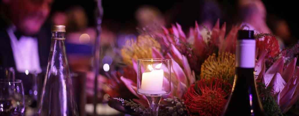 Top Romantic Restaurants near Nashville include scenes like this candlelit table with flowers.
