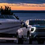 The Silverado 3500 HD towing a boat.
