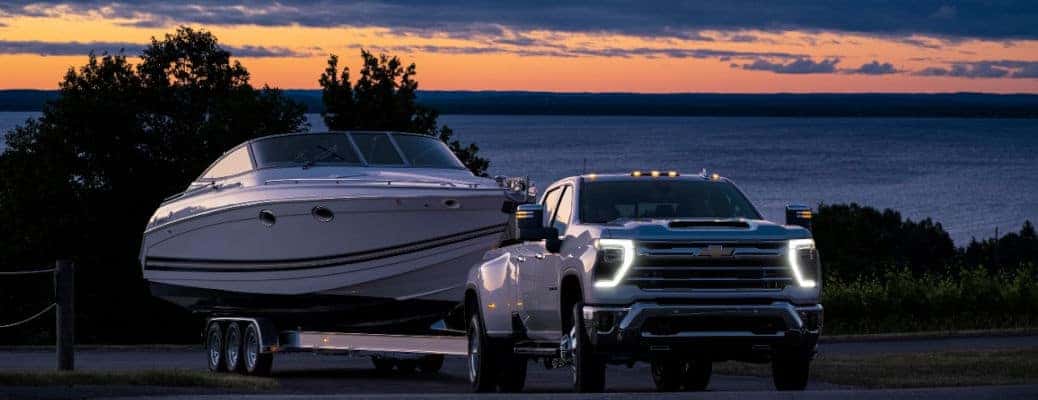 The Silverado 3500 HD towing a boat.