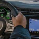 A man using adaptive cruise control in a Chevy vehicle.
