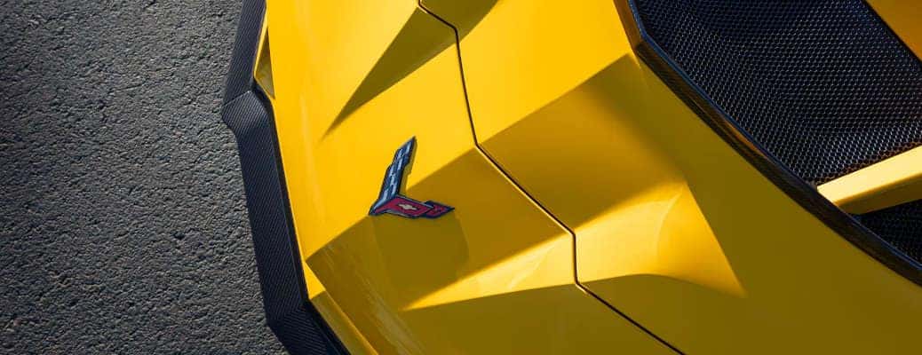 The hood and distinctive logo of the 2025 Chevy Corvette ZR1.