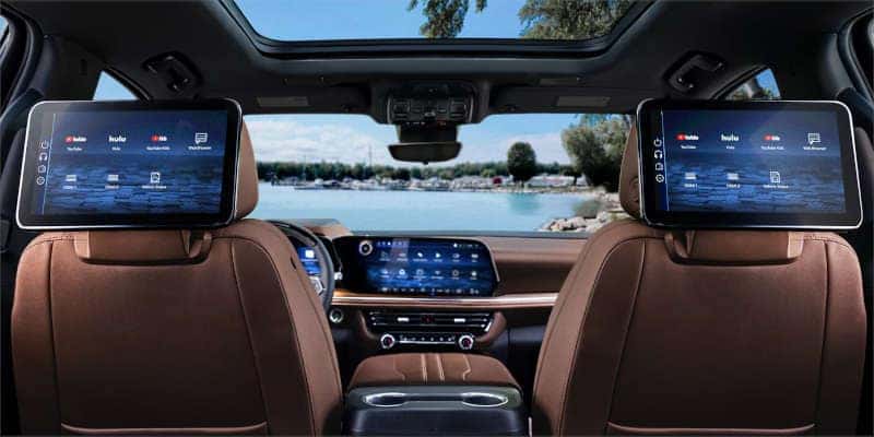 The front and rear infotainment systems in the 2025 Chevy Suburban.