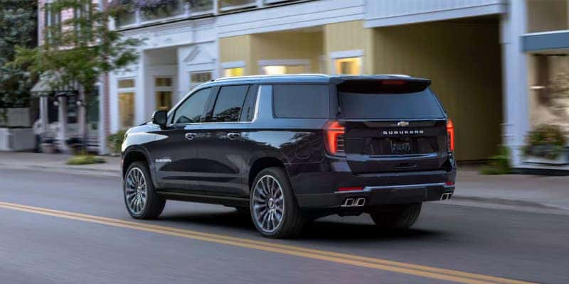 A rear quarter external view of the Chevy Suburban large SUV.