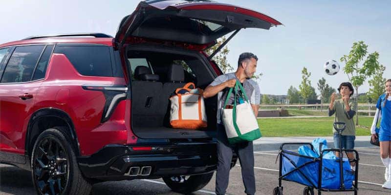 A rear quarter view of the open cargo space in the Chevy Traverse.