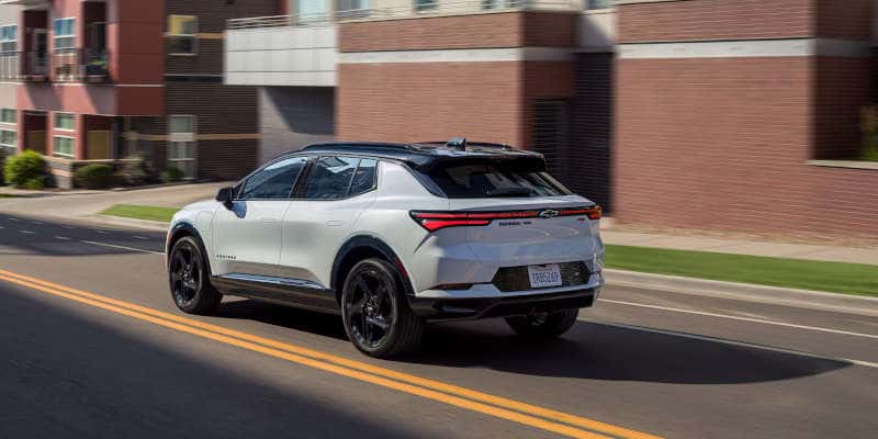 A rear quarter exterior view of the 2025 Chevy Equinox EV.
