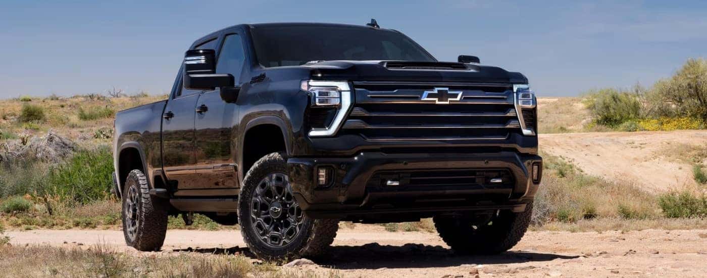 A black 2025 Chevy Silverado 2500 HD after leaving a Chevrolet dealer near South Windsor.