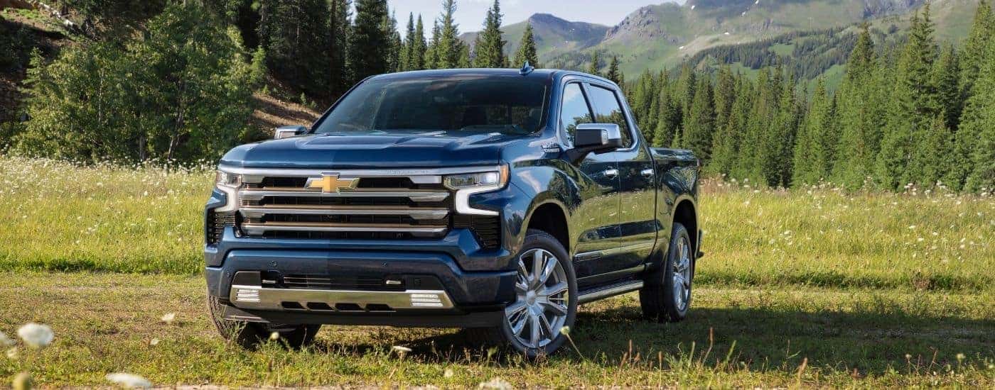 A blue 2025 Chevy Silverado 1500 for sale near South Windsor from the front at an angle.